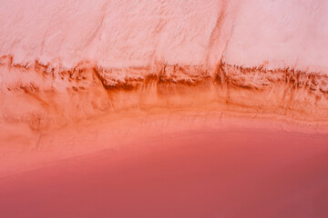 Aerial view of sections at Hutt Lagoon or Pink Lake near Port Gregory in Western Australia, Pink color created naturally by bacteria and harvested in ponds for beta-carotene