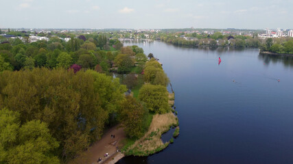 Fototapeta na wymiar Alster Park at River Alster Lake in Hamburg from above - aerial photography