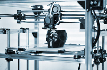 Abstract object of a black color printed by 3d printer.