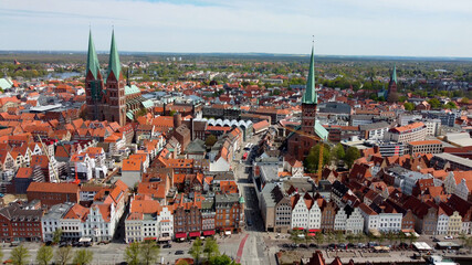 Fototapeta na wymiar Famous Holsten Gate in the city of Lubeck Germany - aerial photography