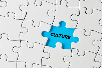 The word culture written on blue missing puzzle piece. Cultural island
