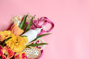 Spring composition with personal hygiene items in a string bag copy space.