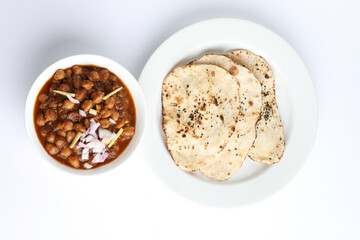 Chole or Chana Masala or Spicy Chickpeas is traditional North Indian main course recipe and usually served with Bhatura or Roti,Naan