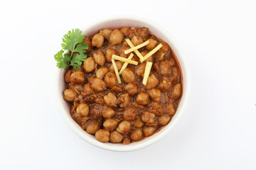 Pindi Chole Kulche or road side choley Kulcha popular in India and pakistan is a popular street food. It's a spicy Chickpea or chana curry served with Indian Flat Bread. Chole masala 