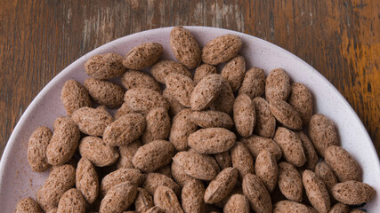 Small oval cookies on a pink plate. High quality photo
