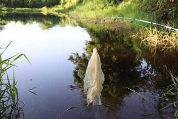 Fishing in the river gets rubbish