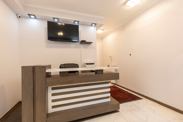 Reception area with wooden reception desk