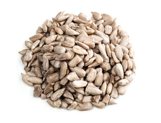 handful of unpeeled sunflower seeds on white