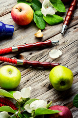 Modern smoking hookah with apple flavor