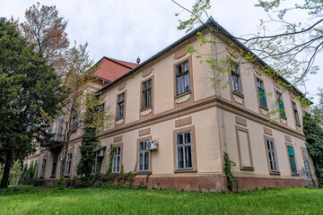 Fototapeta na wymiar Novi Knezevac, Serbia - May 01, 2021: The castle of the Servijski family in Novi Knezevac. The castle was built in 1793.