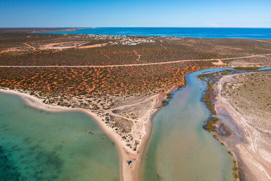 Aerial view of coast and tracks of Little Lagoon Creek around Denham at Shark Bay, Western Australia