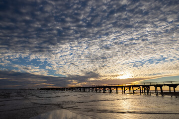 Sunset at wooden and historic One Mile Jetty in Carnarvon, Western Australia