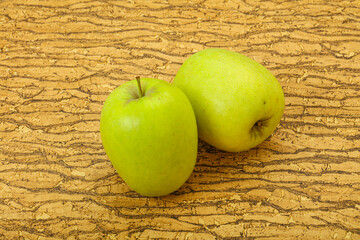 Two ripe green sweet apples