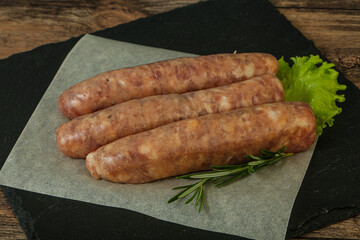 Raw pork meat sausages for grill