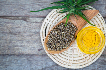 Hemp oil in a glass jar, CBD cannabis oil.Alternative herbs for medicine. copy space.