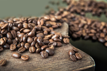 Coffee background close-up macro. Lots of coffee beans and copy space.