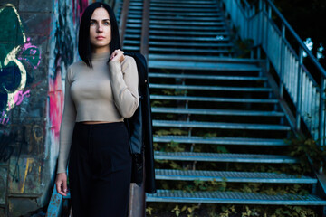 Beautiful woman evening portrait in the city