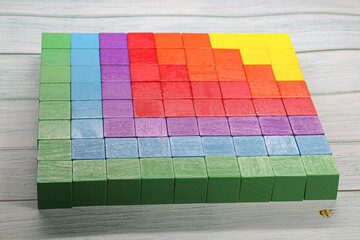 colored cubes fill the space with a sequence of colors
