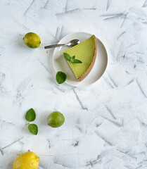 Lemon cheesecake  slice, top view, copy space.