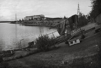 View of the old slabs and the building on the embankment in Perm