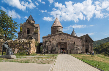 Tourists near armenian medieval monastery complex XII-XIII centuries Goshavank in the village of Gosh in Armenia.