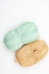 Crochet threads. Yarn of different colors and textures. Knitting needles and yarn.