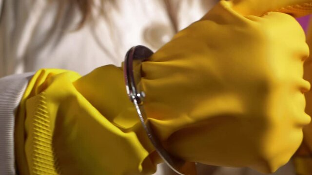 Woman wants to break free from housework wearing handcuffs