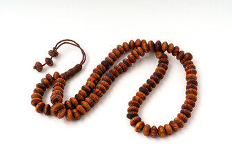 Rosary beads isolated on white background.