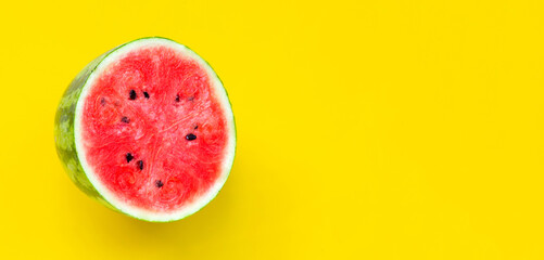 Fresh watermelon on yellow background.
