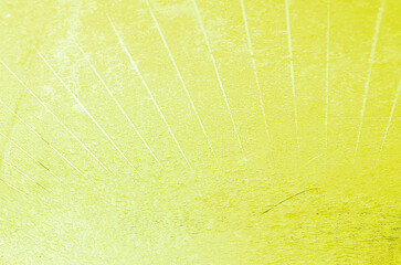 yellow ice textured background with wind screen wiper marke