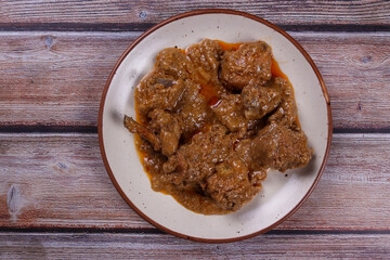 Bengali style spicy curd chicken curry