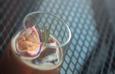 Iced Americano Coffee Mixed with passion fruit juice