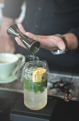 Green tea poured over lemon and Yuzu soda.