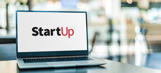 Laptop computer displaying the sign of StartUp