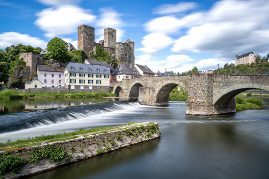 river Lahn in Runkel, Germany with old stone bridge and castle (taken with neutral-density filter)