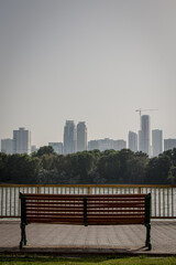 city skyline with the sea at sunset