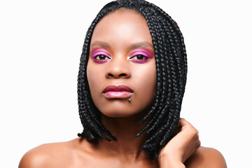 beauty portrait of an african american girl. pink visage make-up. hairstyle braids dreadlocks. white background. isolate