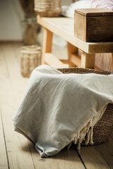 gray linen fabric on wooden background close-up