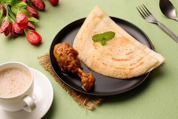 Dosa , Dosai, ghee roast with chicken curry and Indian milk tea popular South Indian Breakfast...