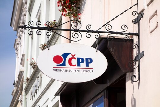 The retro banner of CPP - Ceska Podnikatelska Pojistovna insurance company above the entrance to the office