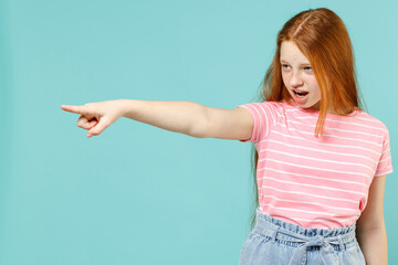 Little strict redhead kid girl 12-13 years old wear pink striped t-shirt point index finger aside...