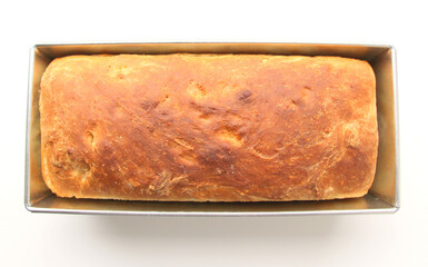 Homemade white wheat bread with a crispy crust. Baking with hand-kneaded yeast dough.