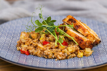 Grilled stuffed pork with bulgur and herbs. Close up