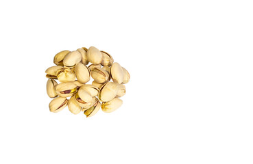 Salt-baked pistachios stacked against a white backdrop. Clipping path.