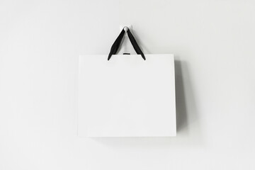 White paper shopping bag on white background with copy space - 436483055