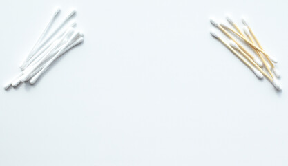 Ecological concept. Wooden and plastic cotton swabs on a white background. Zero waste concept