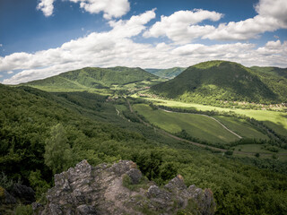 Fototapeta na wymiar A view of the Janosikova Basta mountain in the village of Velka Lodina in Slovakia