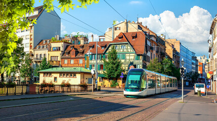 Modern tram on street - obrazy, fototapety, plakaty