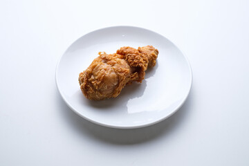 Top view fried chicken leg in white plate