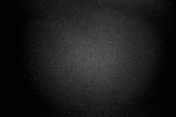 Black paper top view photo for background.